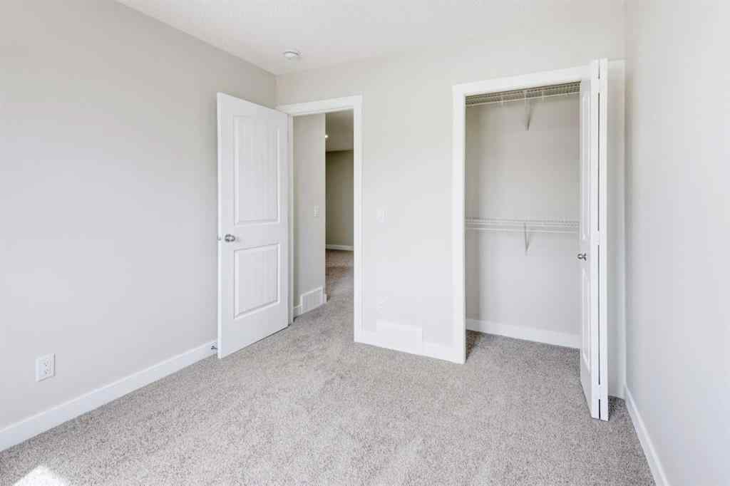 MLS® A2215819 - 166 Creekview Gardens SW in Pine Creek Calgary, Residential