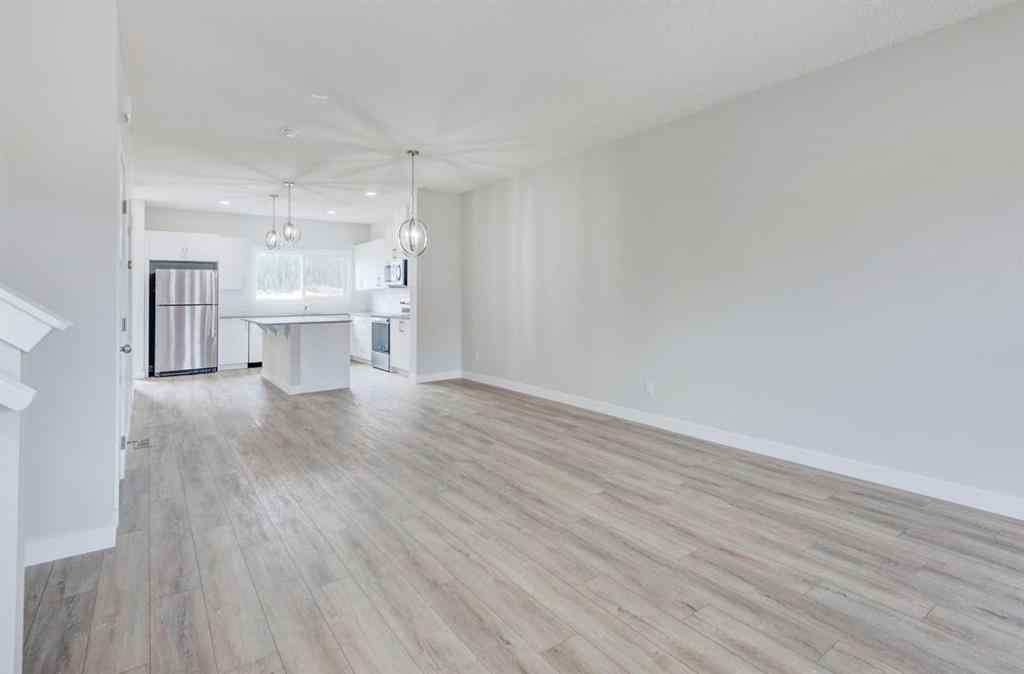 MLS® A2215819 - 166 Creekview Gardens SW in Pine Creek Calgary, Residential
