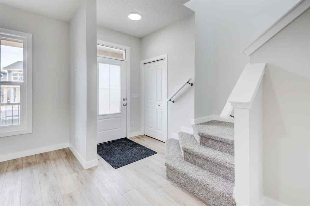 MLS® A2215819 - 166 Creekview Gardens SW in Pine Creek Calgary, Residential