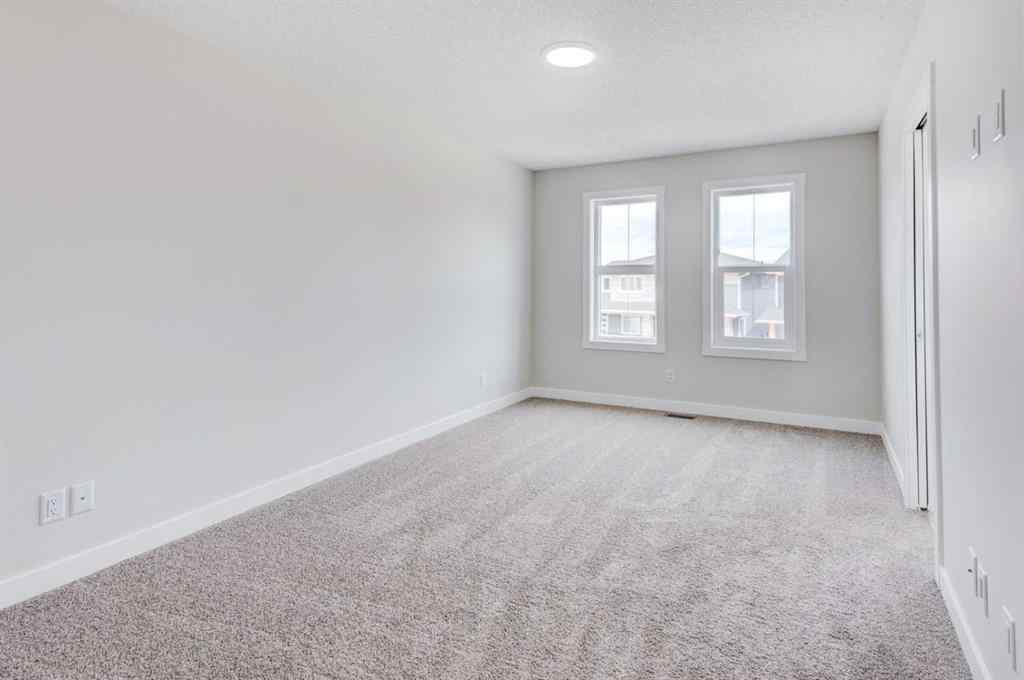 MLS® A2215819 - 166 Creekview Gardens SW in Pine Creek Calgary, Residential