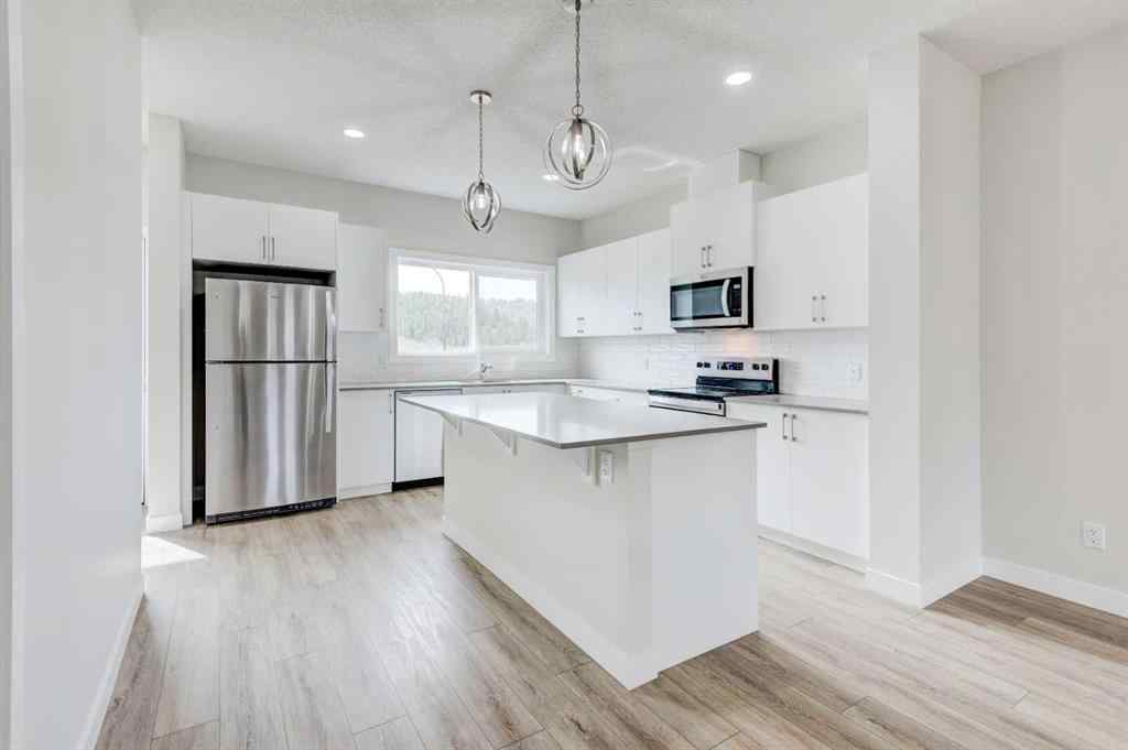 MLS® A2215819 - 166 Creekview Gardens SW in Pine Creek Calgary, Residential