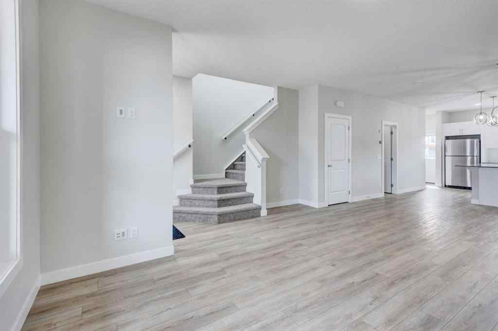MLS® A2215819 - 166 Creekview Gardens SW in Pine Creek Calgary, Residential