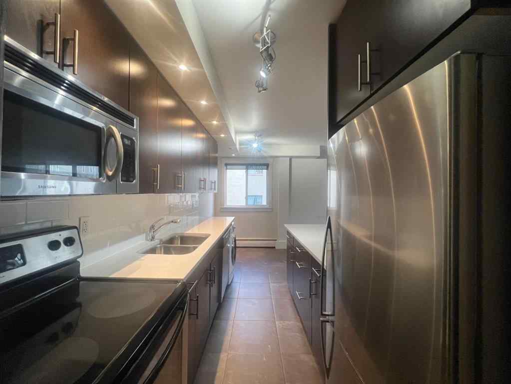 MLS® A2216222 - Unit #16 1230 Cameron Avenue SW in Lower Mount Royal Calgary, Residential
