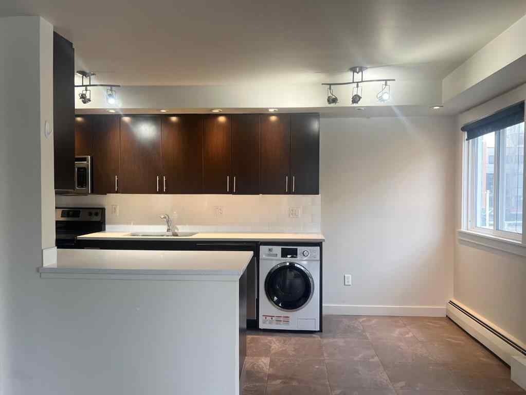 MLS® A2216222 - Unit #16 1230 Cameron Avenue SW in Lower Mount Royal Calgary, Residential