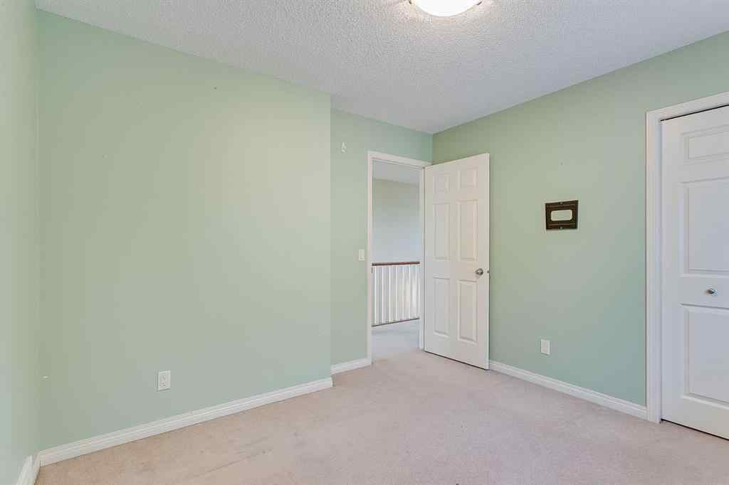 MLS® A2216232 - 596 Cougar Ridge Drive SW in Cougar Ridge Calgary, Residential
