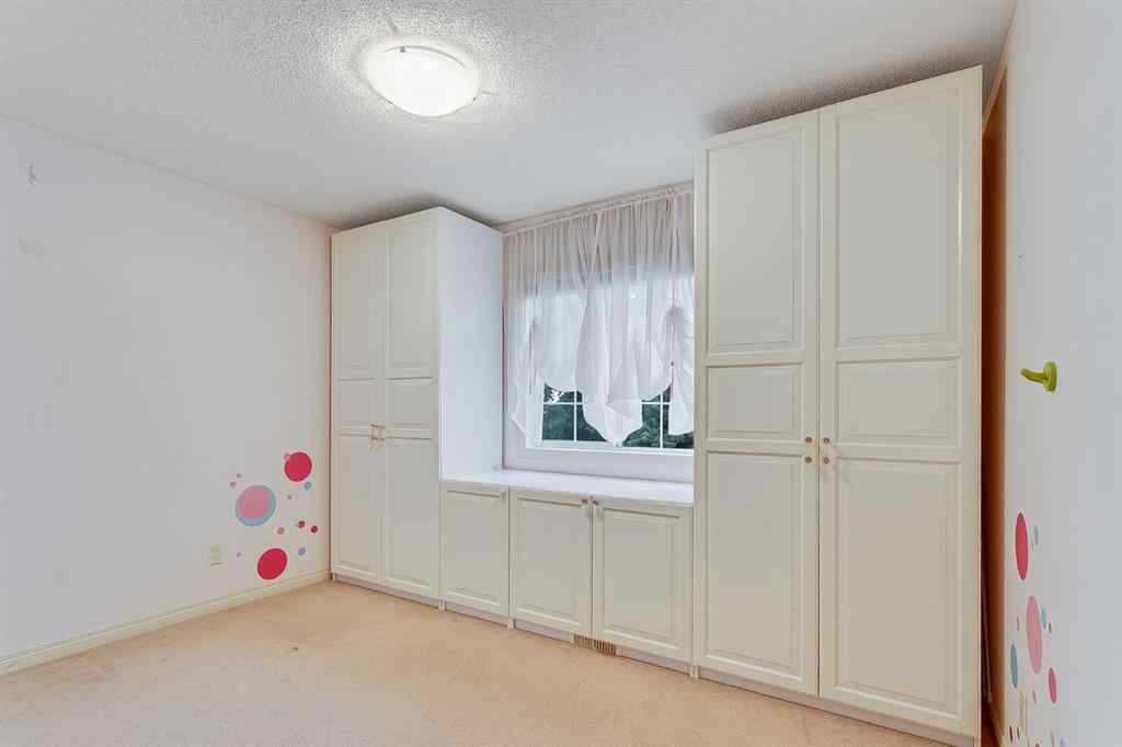 MLS® A2216232 - 596 Cougar Ridge Drive SW in Cougar Ridge Calgary, Residential