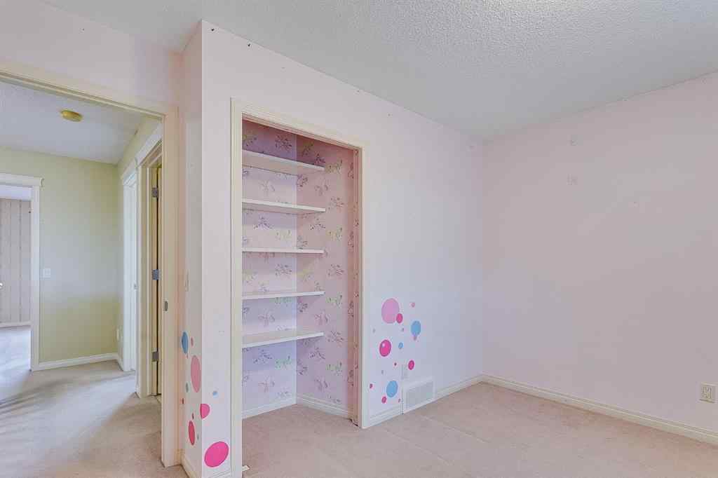 MLS® A2216232 - 596 Cougar Ridge Drive SW in Cougar Ridge Calgary, Residential
