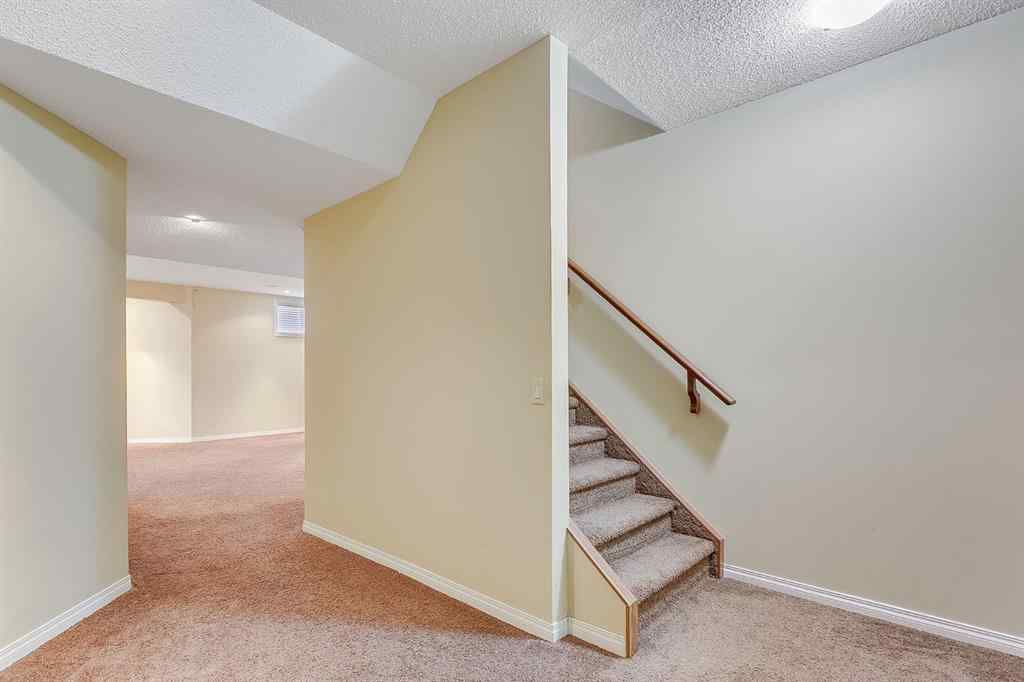 MLS® A2216232 - 596 Cougar Ridge Drive SW in Cougar Ridge Calgary, Residential