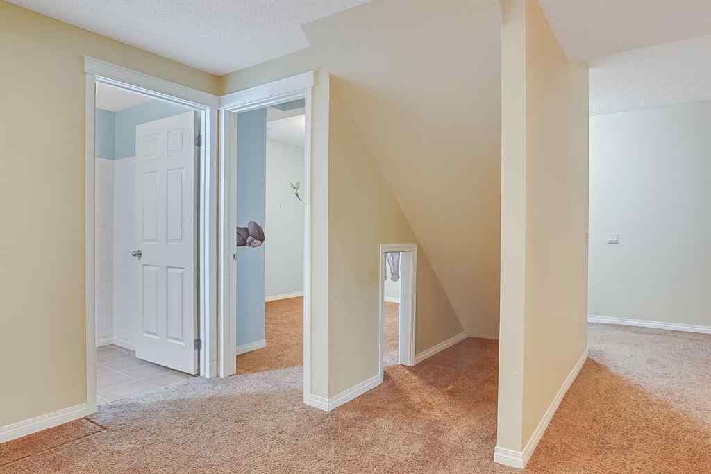 MLS® A2216232 - 596 Cougar Ridge Drive SW in Cougar Ridge Calgary, Residential