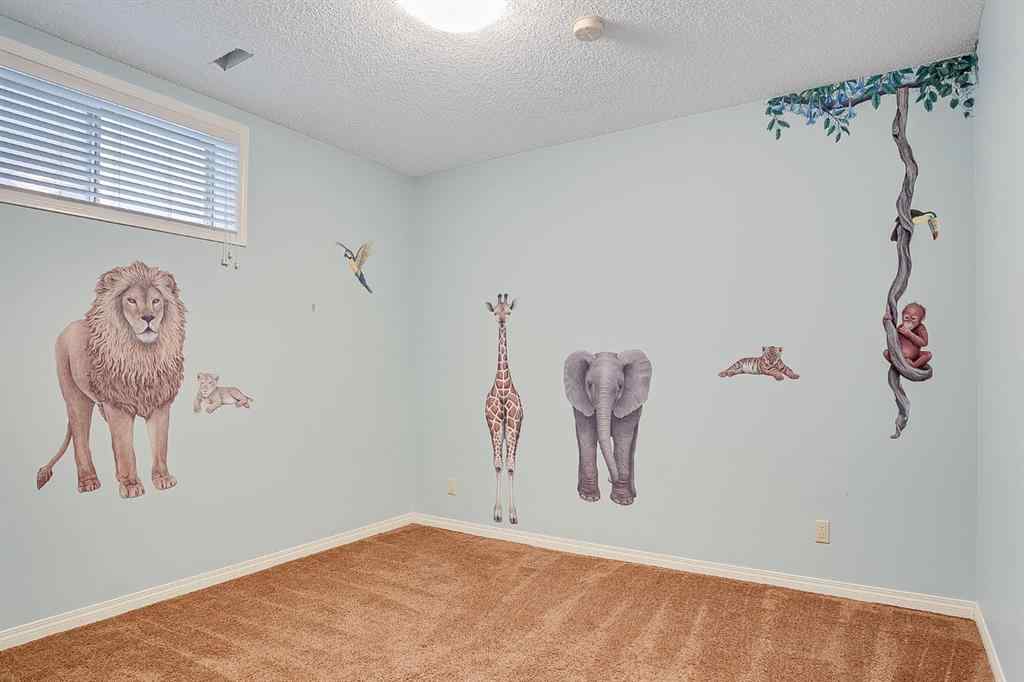 MLS® A2216232 - 596 Cougar Ridge Drive SW in Cougar Ridge Calgary, Residential