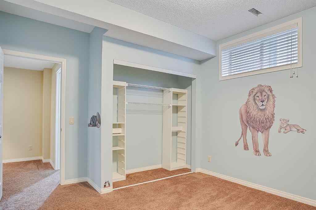 MLS® A2216232 - 596 Cougar Ridge Drive SW in Cougar Ridge Calgary, Residential