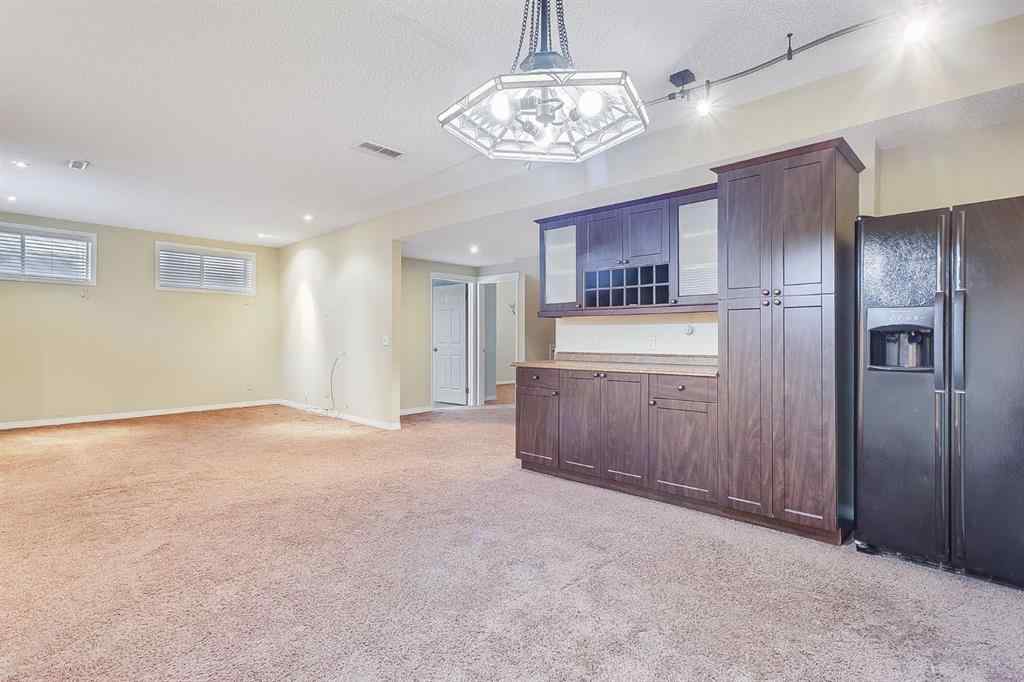 MLS® A2216232 - 596 Cougar Ridge Drive SW in Cougar Ridge Calgary, Residential