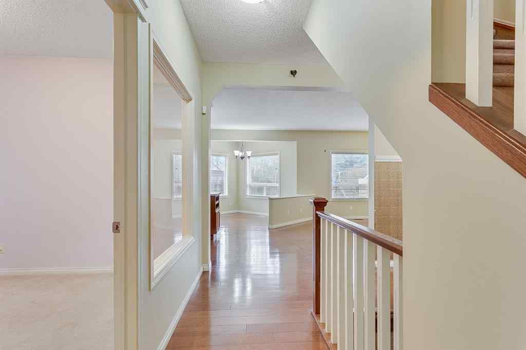 MLS® A2216232 - 596 Cougar Ridge Drive SW in Cougar Ridge Calgary, Residential
