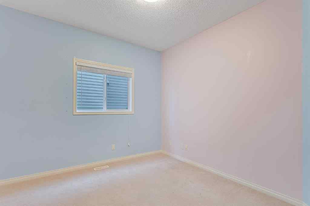 MLS® A2216232 - 596 Cougar Ridge Drive SW in Cougar Ridge Calgary, Residential