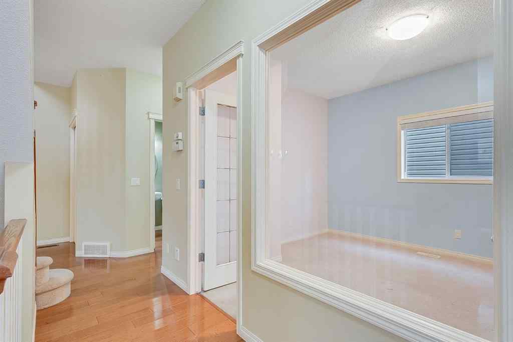 MLS® A2216232 - 596 Cougar Ridge Drive SW in Cougar Ridge Calgary, Residential