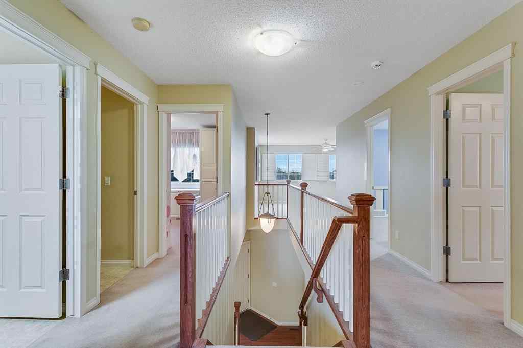 MLS® A2216232 - 596 Cougar Ridge Drive SW in Cougar Ridge Calgary, Residential