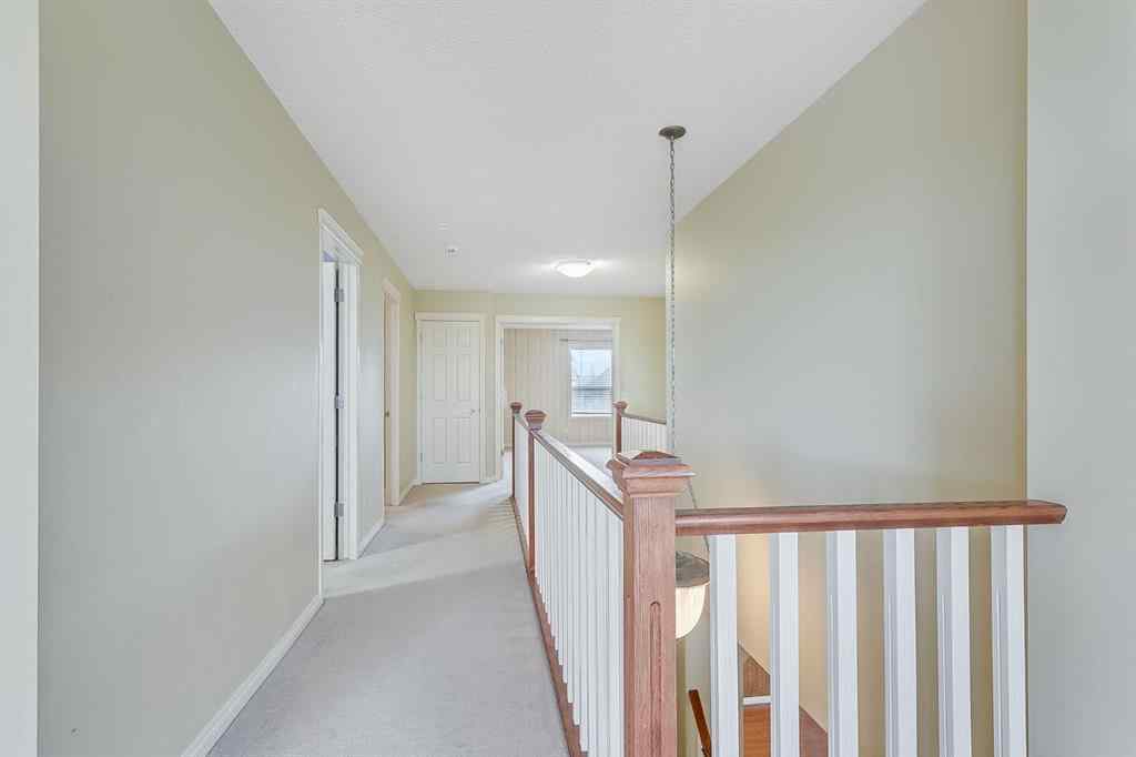 MLS® A2216232 - 596 Cougar Ridge Drive SW in Cougar Ridge Calgary, Residential