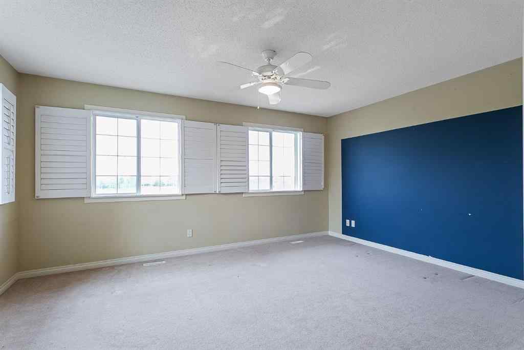 MLS® A2216232 - 596 Cougar Ridge Drive SW in Cougar Ridge Calgary, Residential