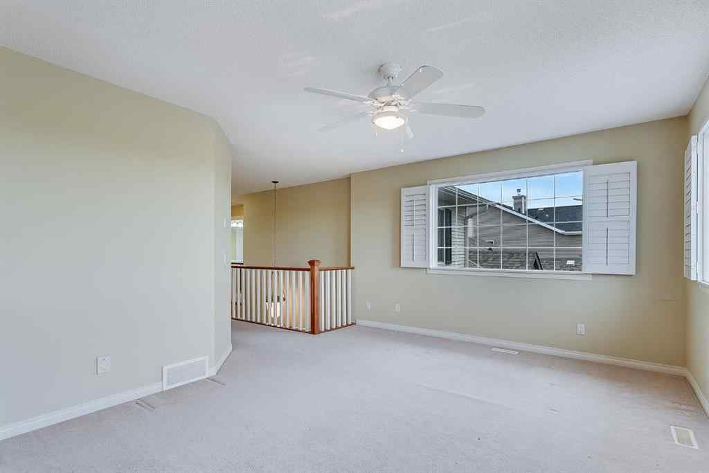 MLS® A2216232 - 596 Cougar Ridge Drive SW in Cougar Ridge Calgary, Residential