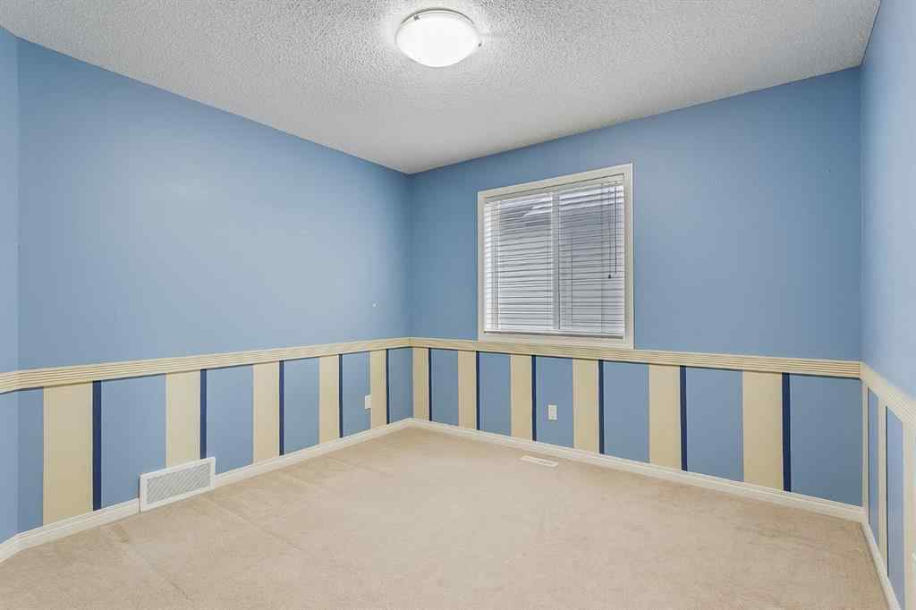 MLS® A2216232 - 596 Cougar Ridge Drive SW in Cougar Ridge Calgary, Residential