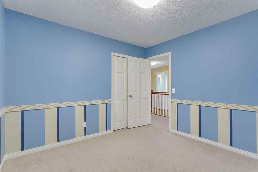 MLS® A2216232 - 596 Cougar Ridge Drive SW in Cougar Ridge Calgary, Residential
