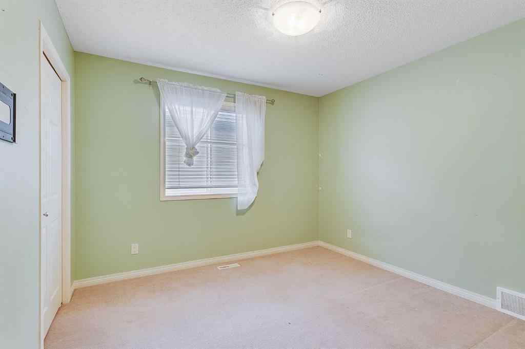 MLS® A2216232 - 596 Cougar Ridge Drive SW in Cougar Ridge Calgary, Residential