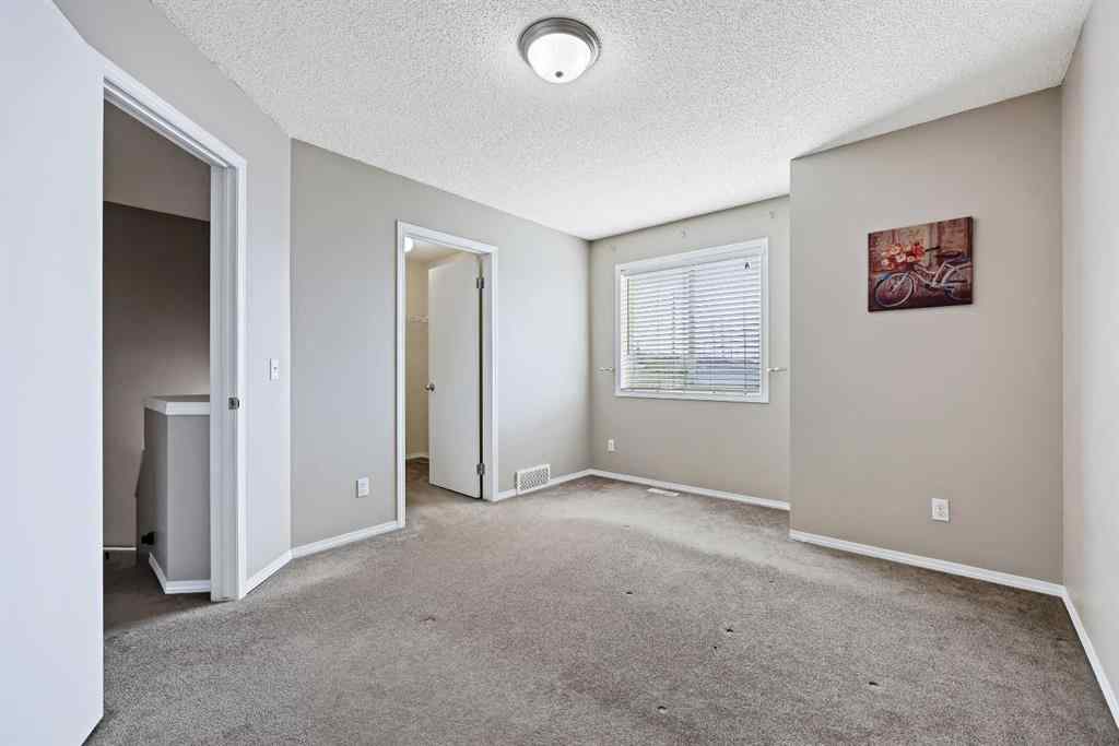 MLS® A2216753 - 45 Tuscany Springs Gardens NW in Tuscany Calgary, Residential