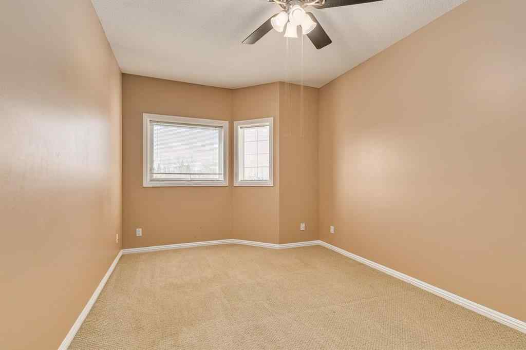 MLS® A2216966 - Unit #204 7 Lineham Avenue  in Heritage Okotoks Okotoks, Residential