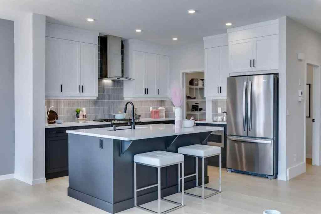 MLS® A2217010 - 56 Creekstone Grove SW in Pine Creek Calgary, Residential