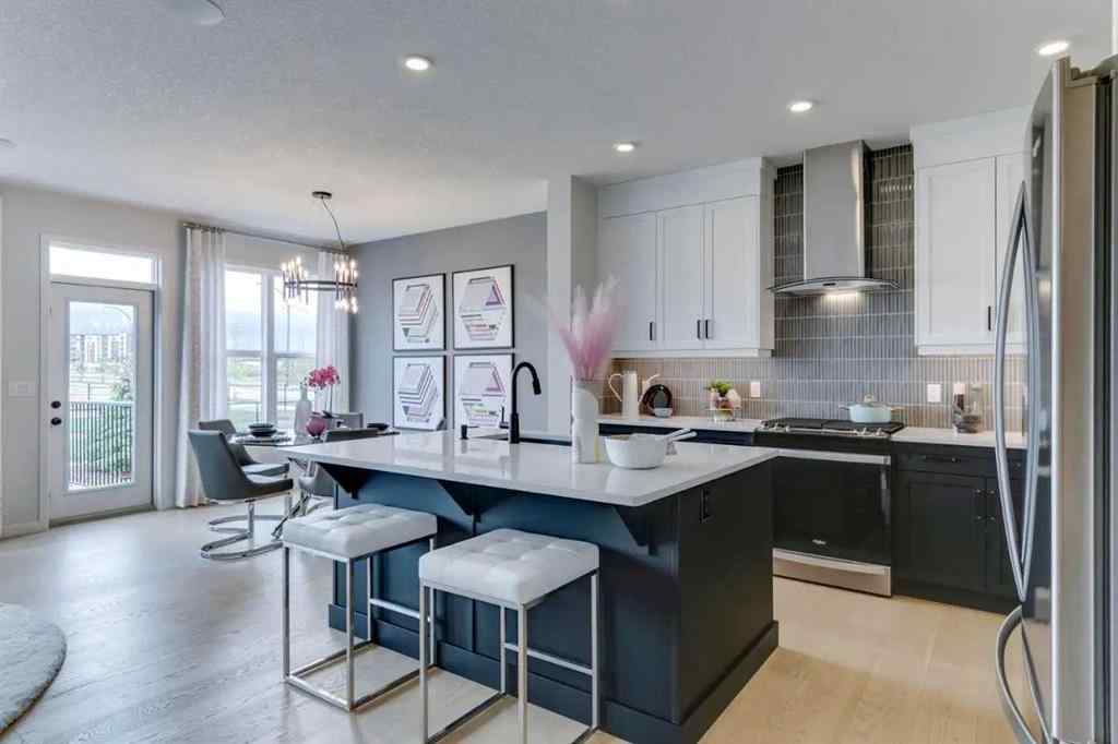 MLS® A2217010 - 56 Creekstone Grove SW in Pine Creek Calgary, Residential