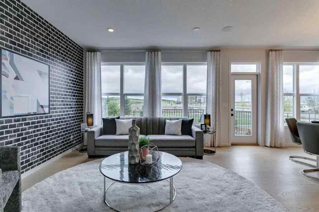 MLS® A2217010 - 56 Creekstone Grove SW in Pine Creek Calgary, Residential
