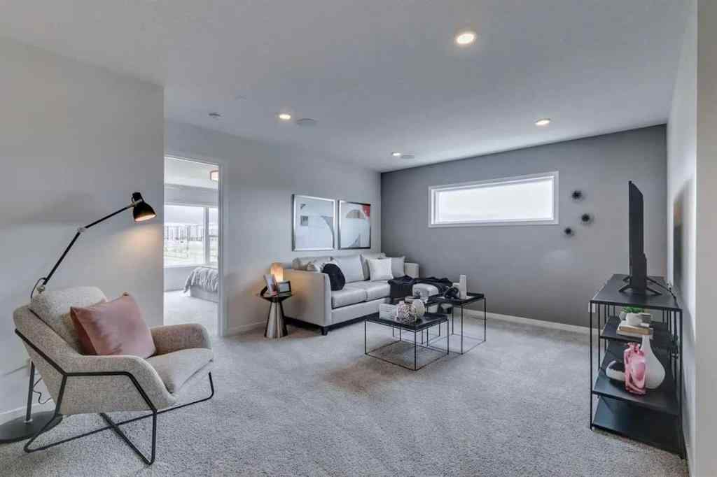MLS® A2217010 - 56 Creekstone Grove SW in Pine Creek Calgary, Residential