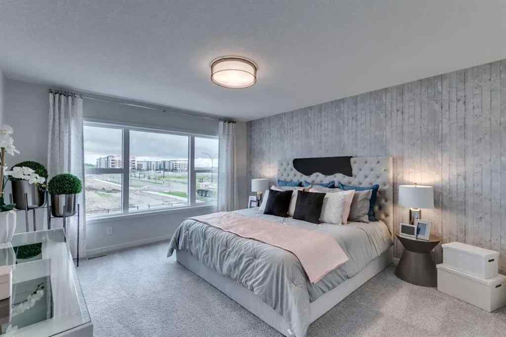 MLS® A2217010 - 56 Creekstone Grove SW in Pine Creek Calgary, Residential