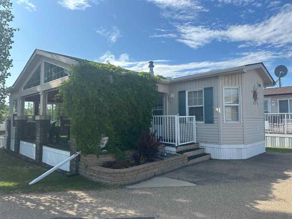 MLS® A2217039 - Unit #2049 25054 South Pine Lake Road  in Whispering Pines Rural Red Deer County, Residential