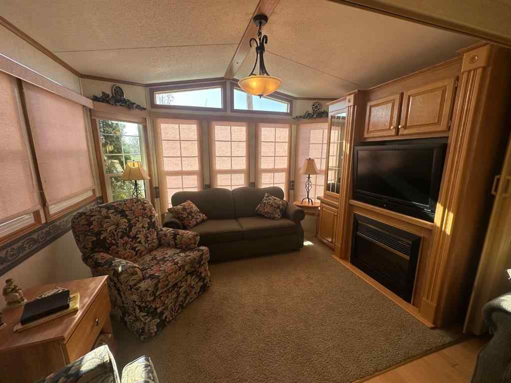 MLS® A2217039 - Unit #2049 25054 South Pine Lake Road  in Whispering Pines Rural Red Deer County, Residential