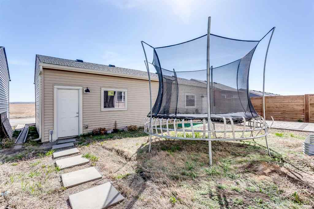MLS® A2217122 - 7561 202 Avenue SE in Rangeview Calgary, Residential