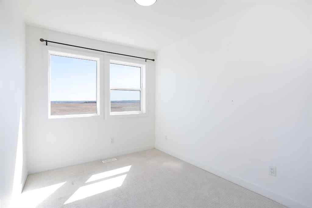 MLS® A2217122 - 7561 202 Avenue SE in Rangeview Calgary, Residential