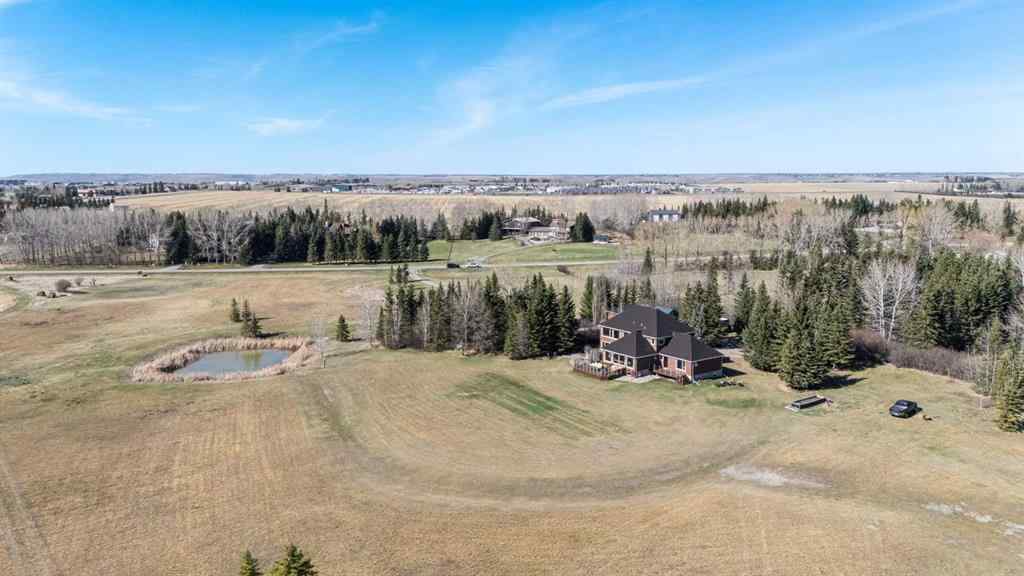 MLS® A2217191 - 225 Huggard Road  in Springbank Rural Rocky View County, Residential