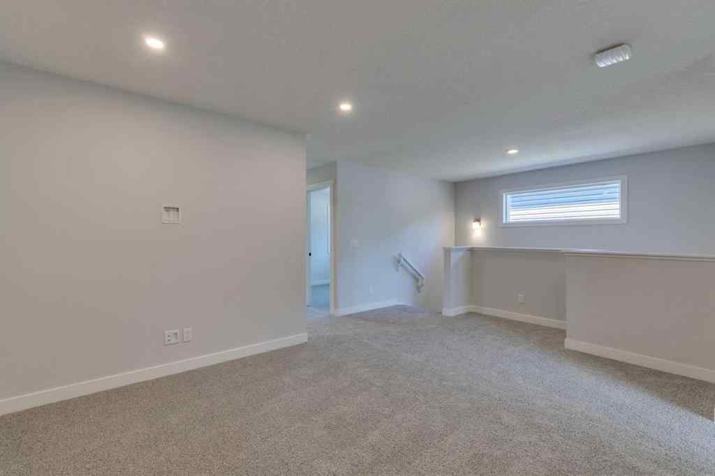 MLS® A2217310 - 126 Belmont Passage SW in Belmont Calgary, Residential