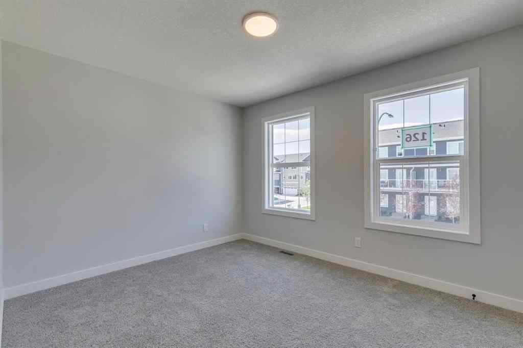 MLS® A2217310 - 126 Belmont Passage SW in Belmont Calgary, Residential