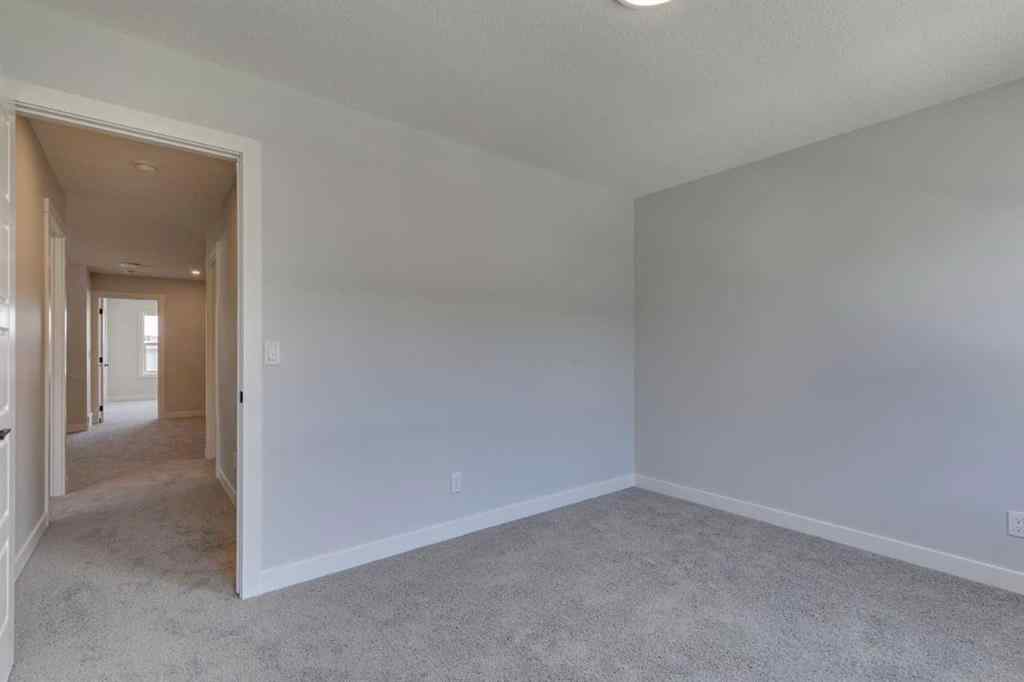 MLS® A2217310 - 126 Belmont Passage SW in Belmont Calgary, Residential