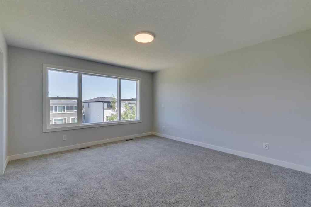 MLS® A2217310 - 126 Belmont Passage SW in Belmont Calgary, Residential