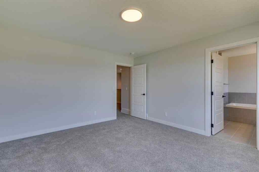 MLS® A2217310 - 126 Belmont Passage SW in Belmont Calgary, Residential