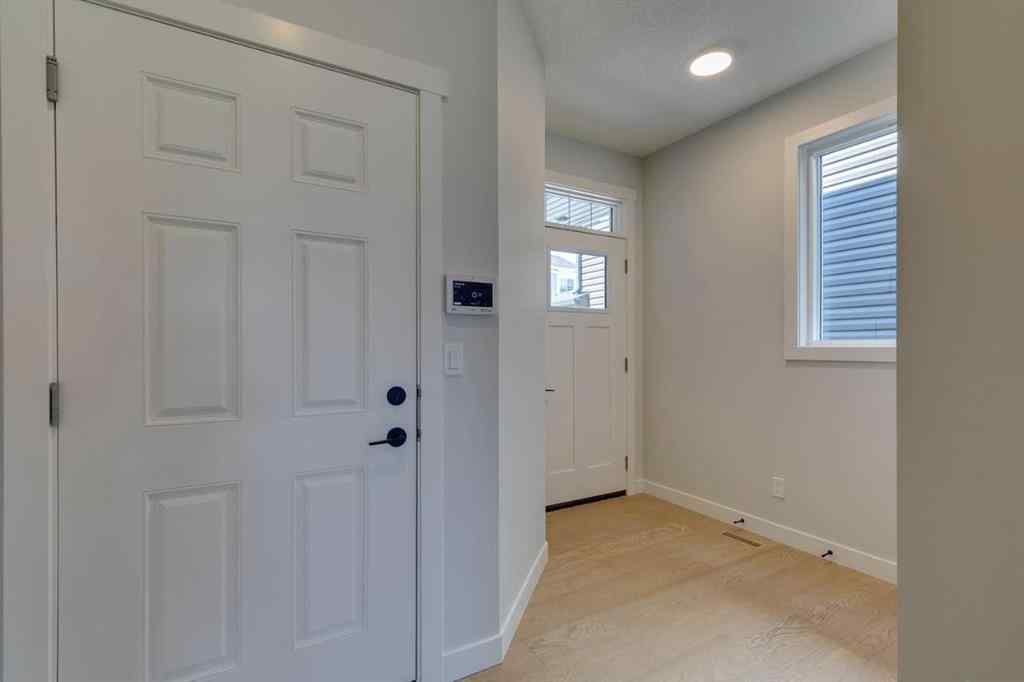 MLS® A2217310 - 126 Belmont Passage SW in Belmont Calgary, Residential