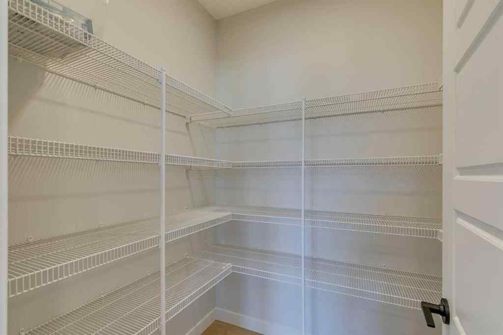 MLS® A2217310 - 126 Belmont Passage SW in Belmont Calgary, Residential