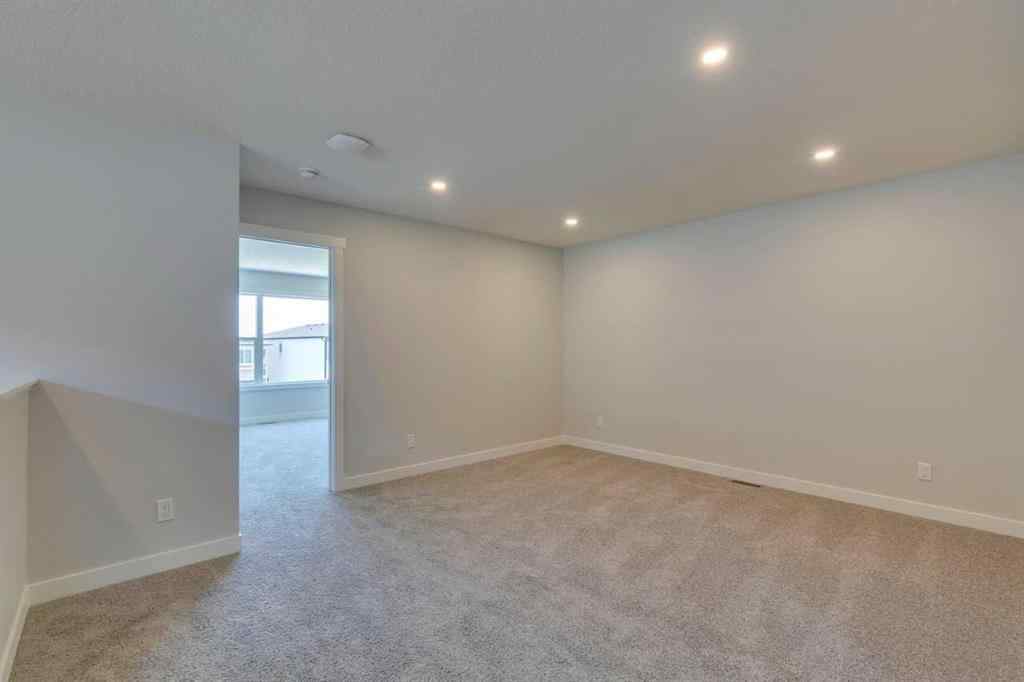 MLS® A2217310 - 126 Belmont Passage SW in Belmont Calgary, Residential