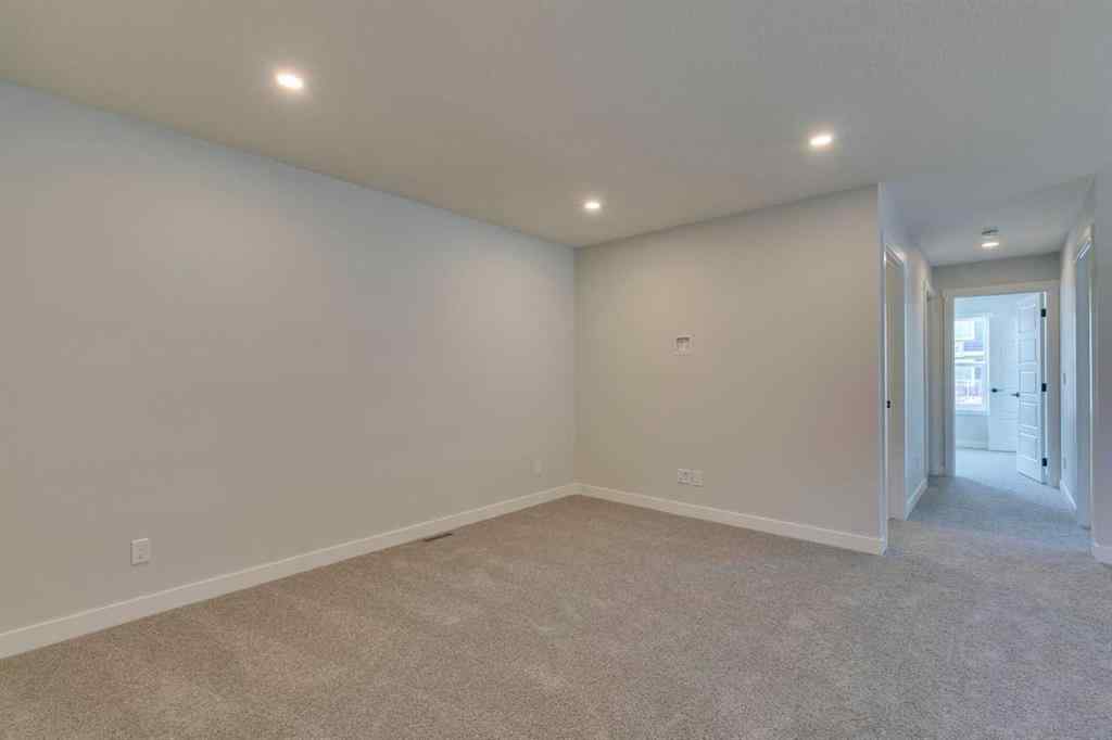 MLS® A2217310 - 126 Belmont Passage SW in Belmont Calgary, Residential