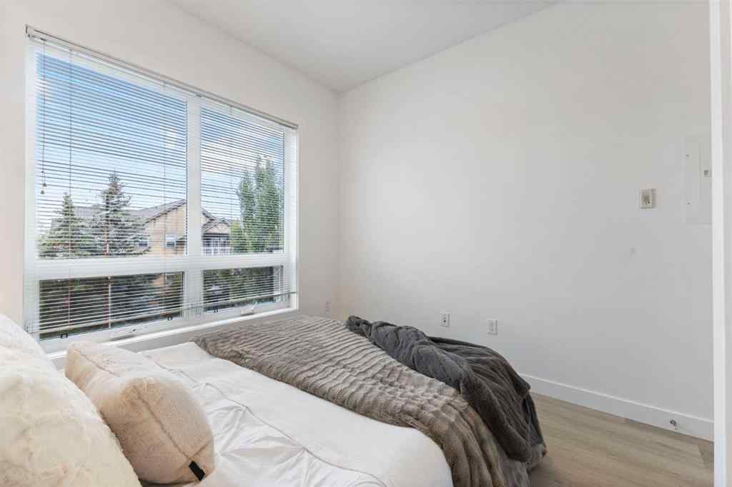 MLS® A2217323 - Unit #312 15233 1 Street SE in Midnapore Calgary, Residential