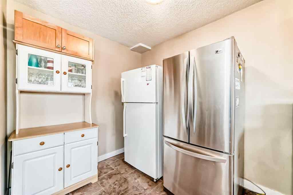MLS® A2217421 - 148 Pinemill Mews NE in Pineridge Calgary, Residential
