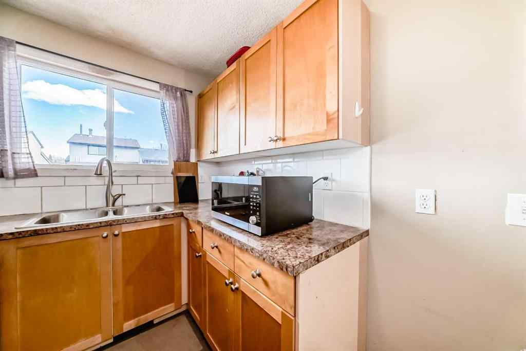 MLS® A2217421 - 148 Pinemill Mews NE in Pineridge Calgary, Residential